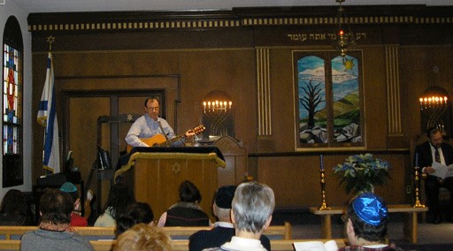 View of congregation with Steve Kunzman leading a song